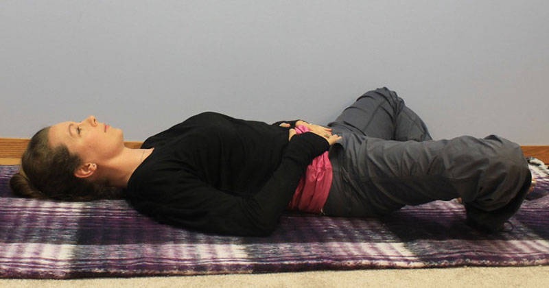 Bound angle reclined yoga pose