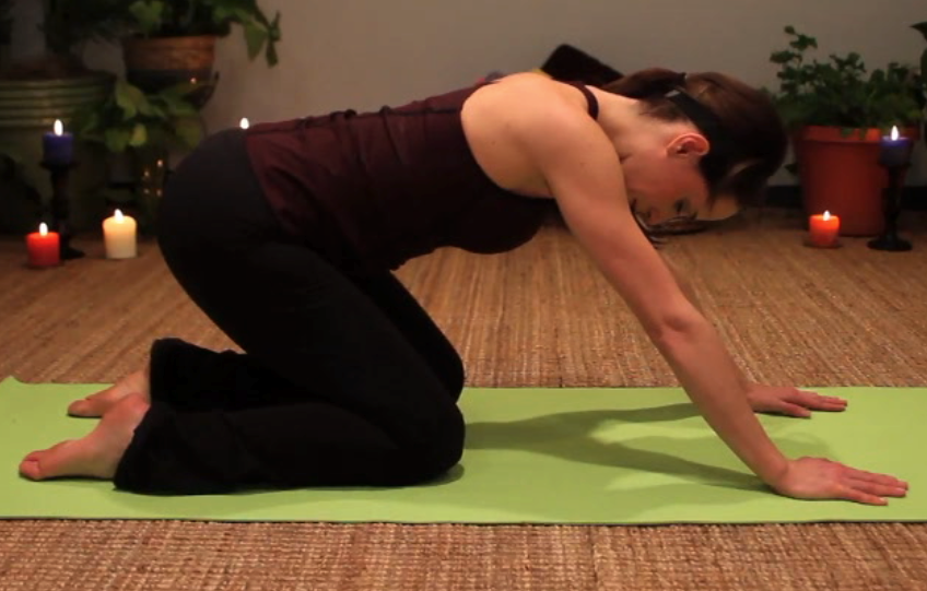 Rock back yoga posture