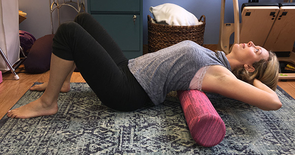Spinal extension with a foam roller